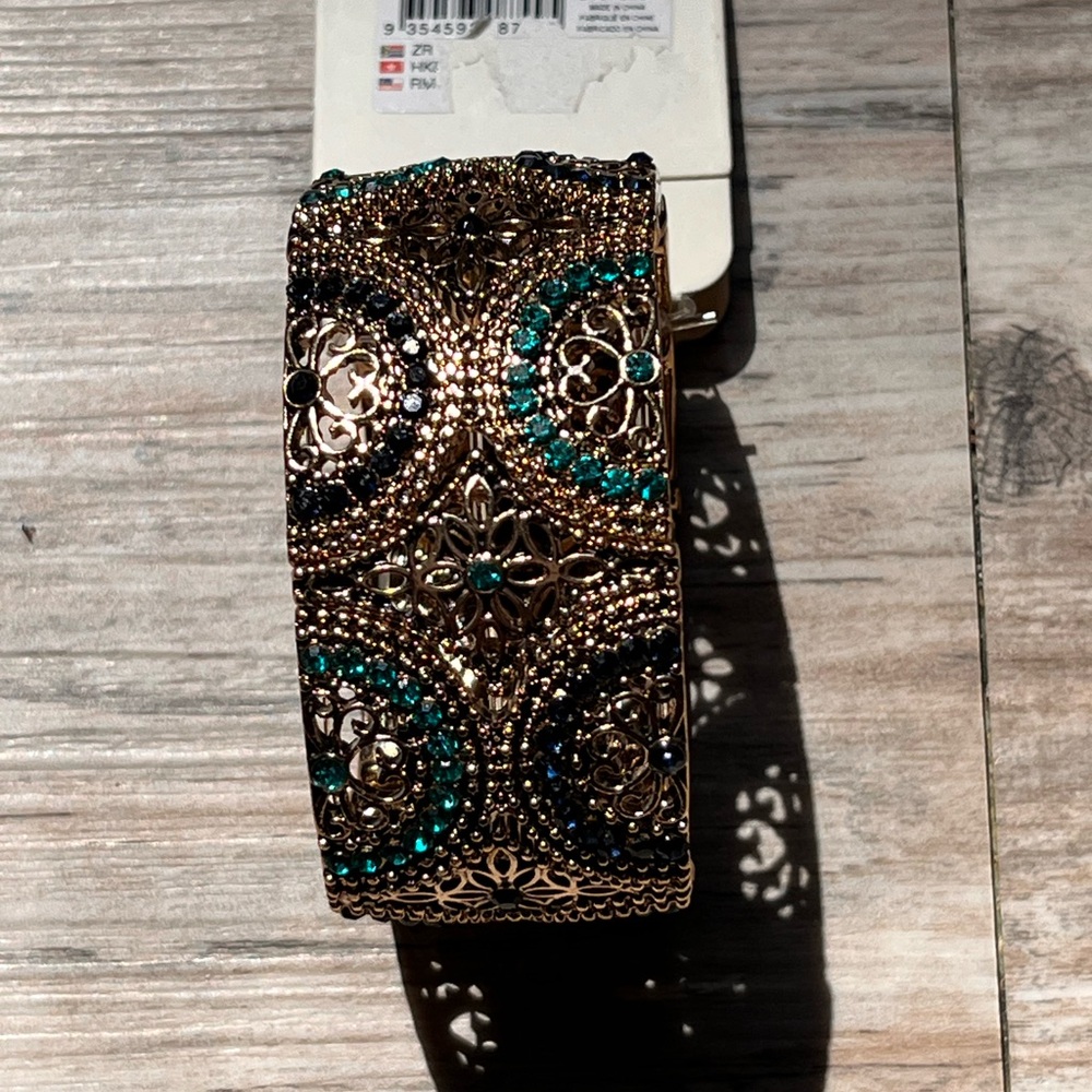 Intricate Gold and Green metal Bracelet